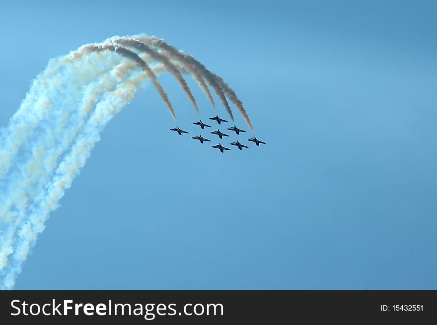 Jet aircraft flying in formation with smoke, room for copy. Jet aircraft flying in formation with smoke, room for copy