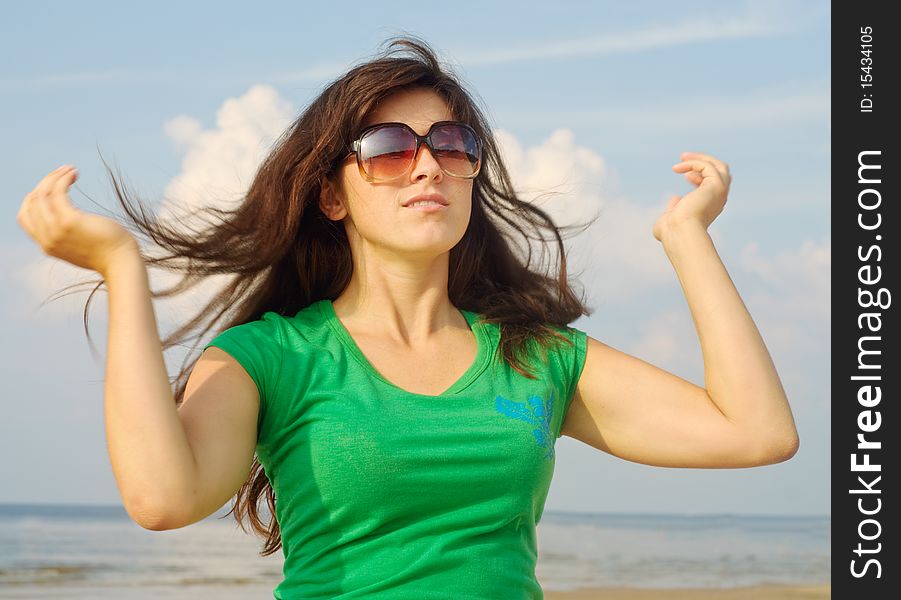 Young happy woman on sea beach. Young happy woman on sea beach