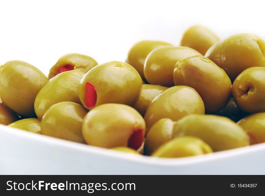 Green olives, stuffed with red peppers