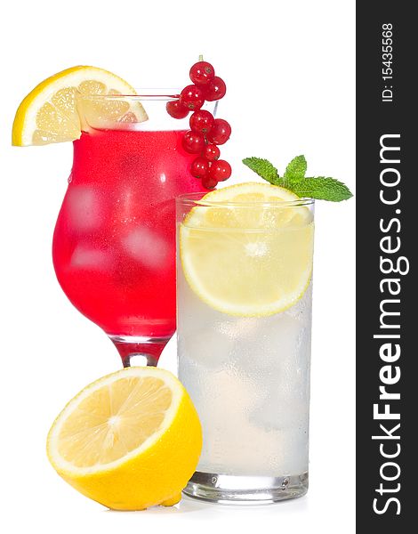 Red cocktail and lemonade with lemon on white background