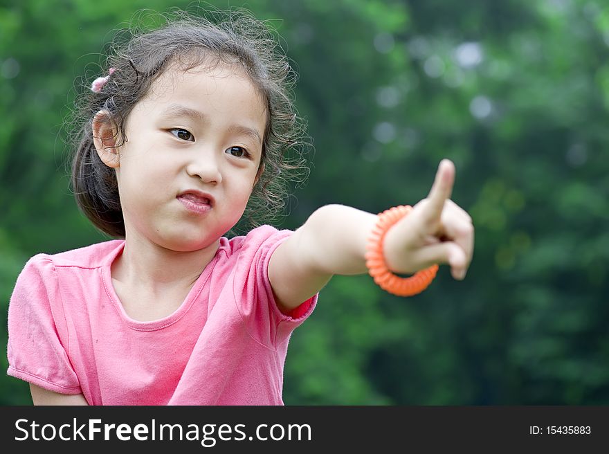 Happy little girl make a naughty pose. Happy little girl make a naughty pose.