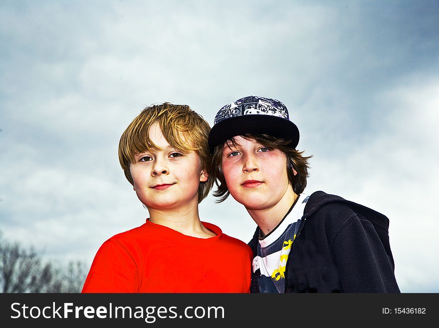 Young boy friends smile and feeling happy at skate park