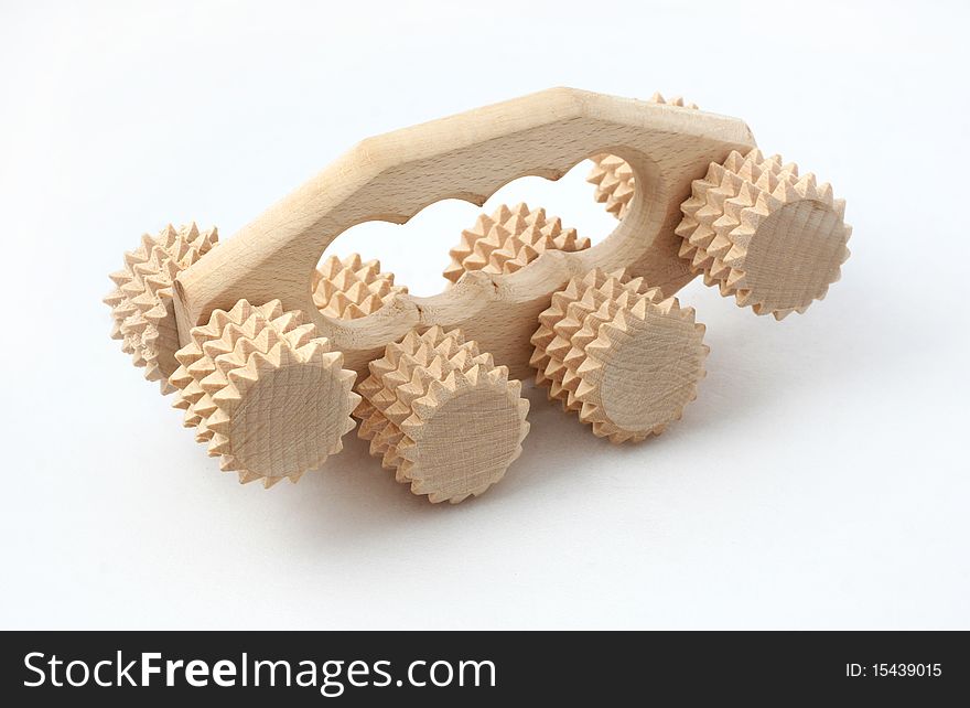Studio photography of a wooden massage roller isolated on white. Studio photography of a wooden massage roller isolated on white