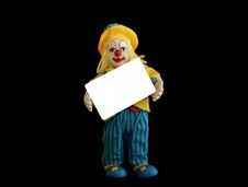 Figurine Of The Clown With A Blank Credit Card Royalty Free Stock Photo