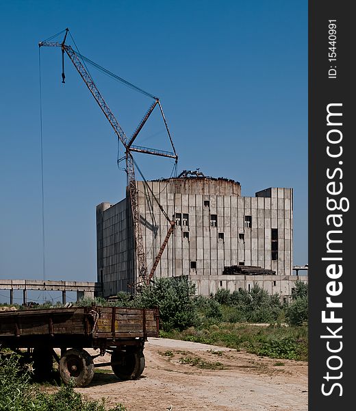 Unfinished nuclear power plant in Crimea, Ukraine with junk odl trailer. Unfinished nuclear power plant in Crimea, Ukraine with junk odl trailer