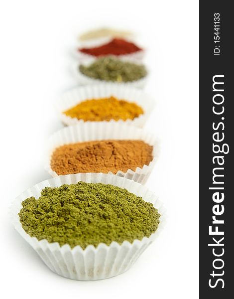 Different tipes of spice spices on white background