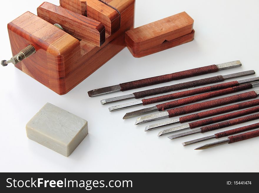 Carving Toolsã€‚a set of carving knivesï¼ŒWood Pedestal and stone.