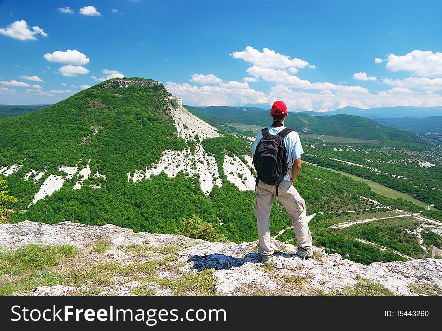 Man on the peak of mountain. Landscape composition. Man on the peak of mountain. Landscape composition.