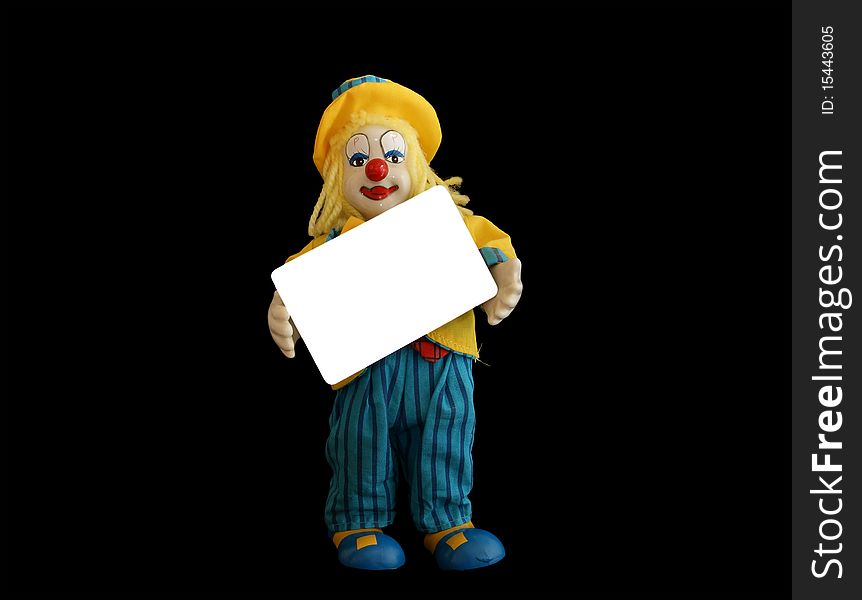 figurine of the clown with a blank credit card