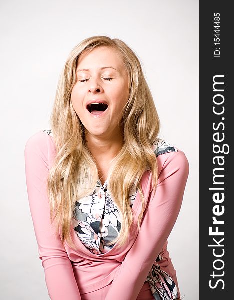 Women yawning in white background