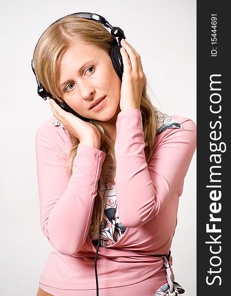 Women with headphones listening music