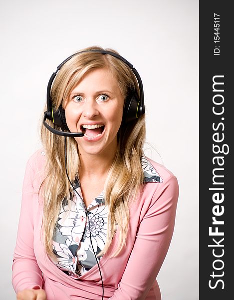 Women with headphones with mad face expresion