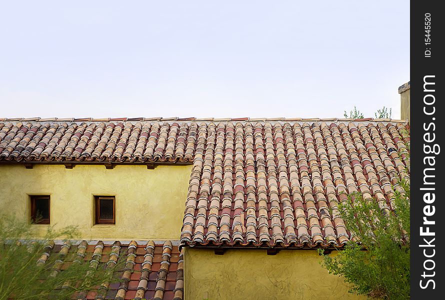 Old roof top tiles on old home in Tuscany