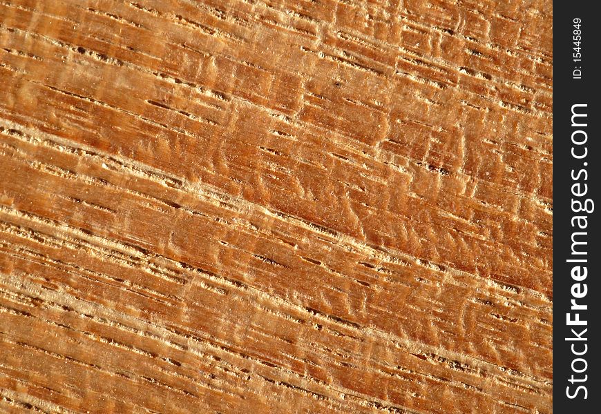 Details of surface of brown teak wood.