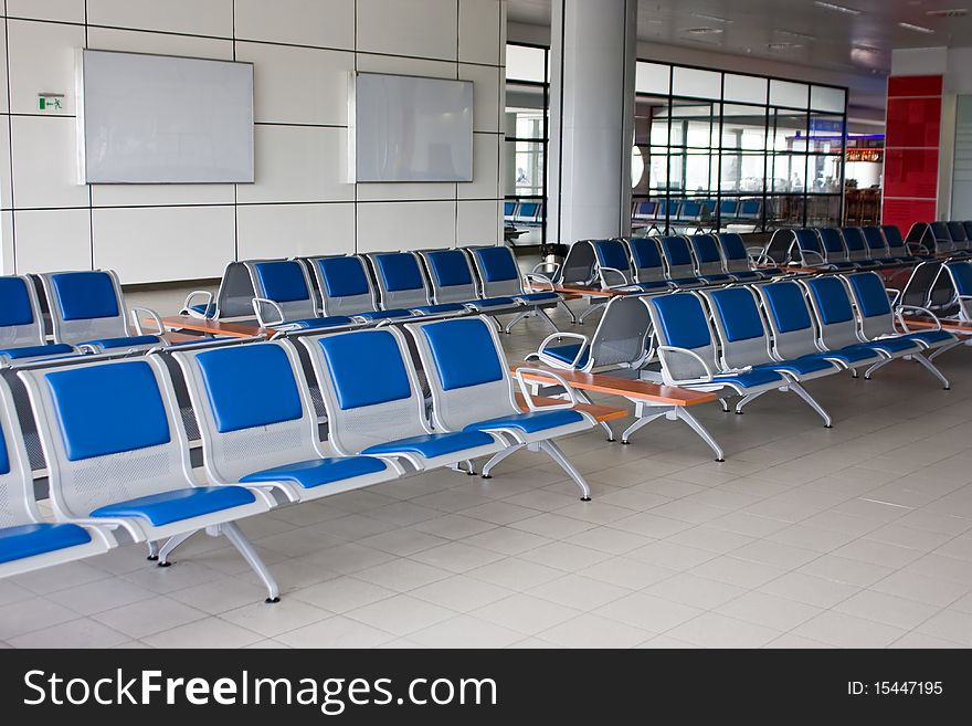 Seats with no people on the airport. Seats with no people on the airport.