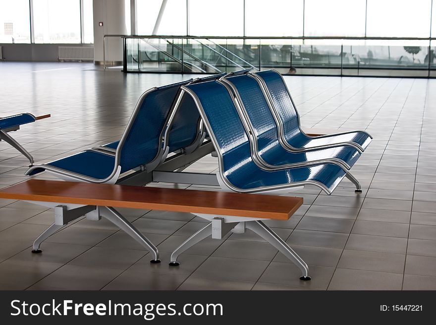 Seats with no people on the airport. Seats with no people on the airport.