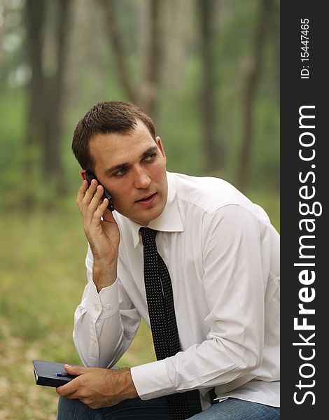 Portrait of young attractive man, outdoors