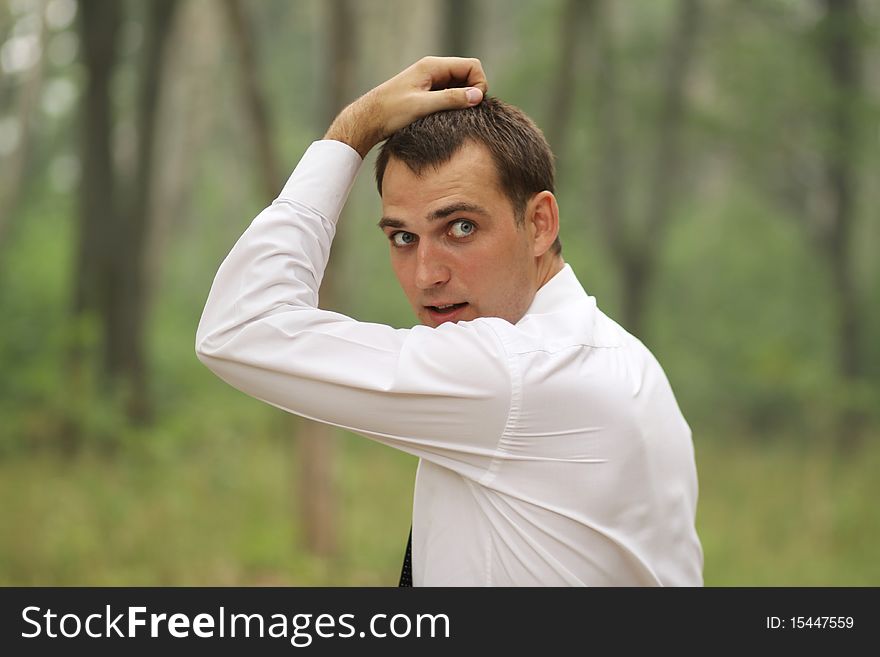 Portrait of young attractive man, outdoors