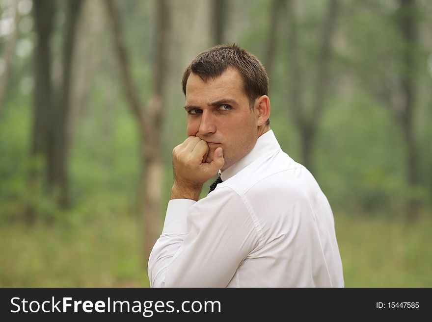 Portrait of young attractive man, outdoors