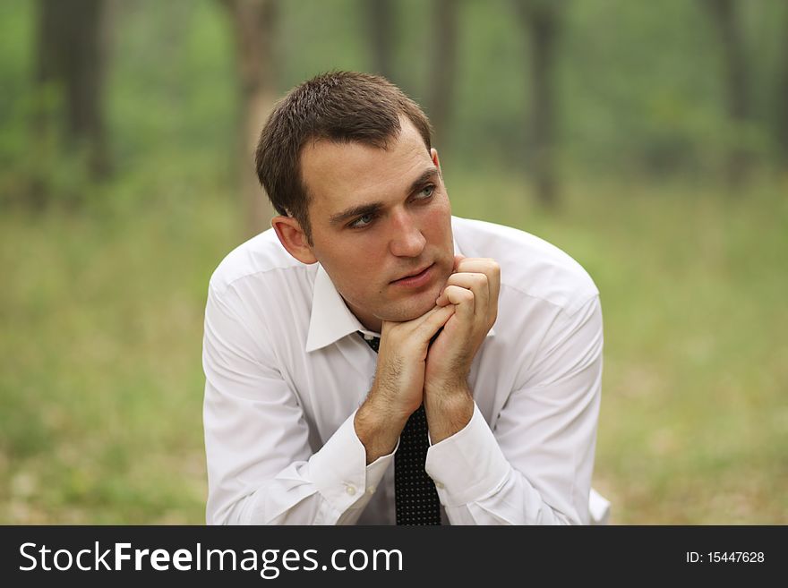 Portrait of young attractive man, outdoors