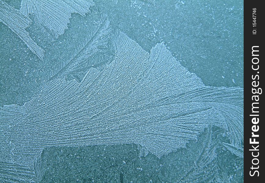 Ice on a car window on a winters morning. Ice on a car window on a winters morning.