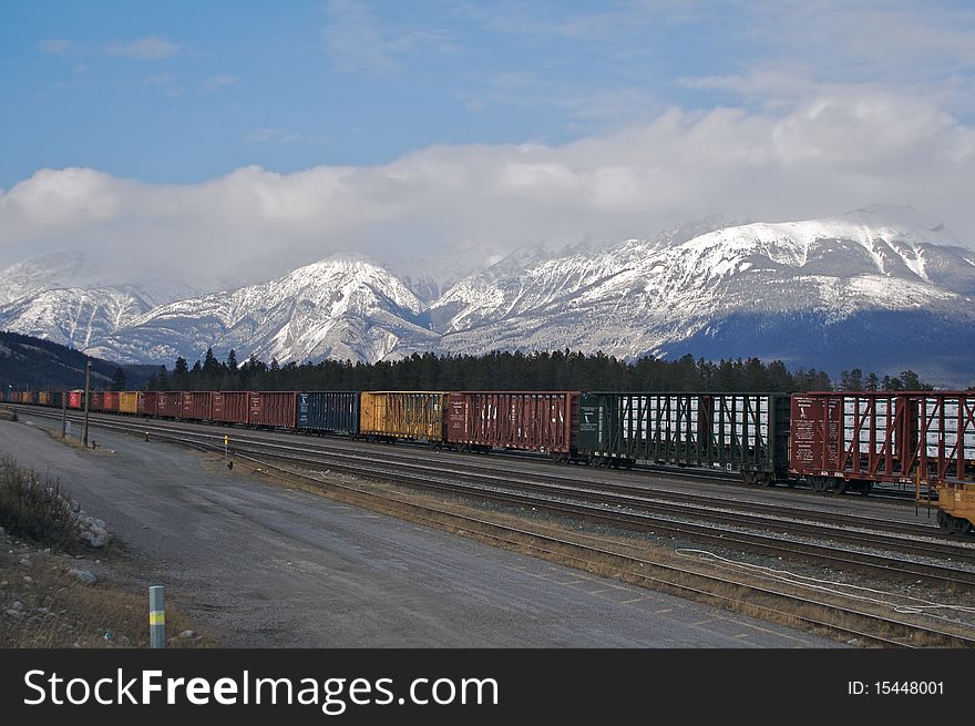 Freight carriages backing on to mountains, jasper. Freight carriages backing on to mountains, jasper.