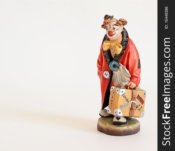 The isolated figurine of the clown