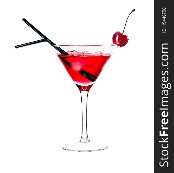 Red drink in martini glass, garnished with marachino cherry. Isolated on white background. Red drink in martini glass, garnished with marachino cherry. Isolated on white background.