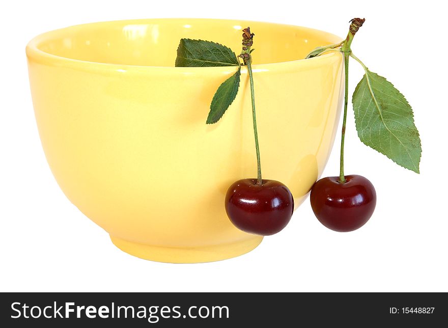 Fresh bright red cherry closeup, isolated on a white background. Fresh bright red cherry closeup, isolated on a white background