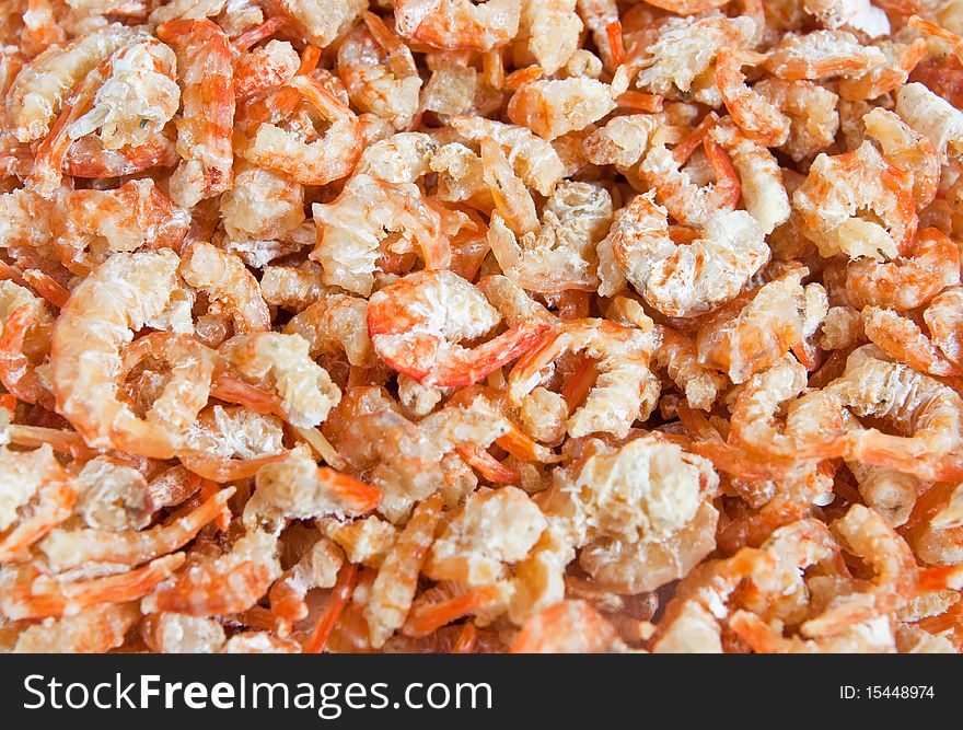 Orange background of dried shrimps