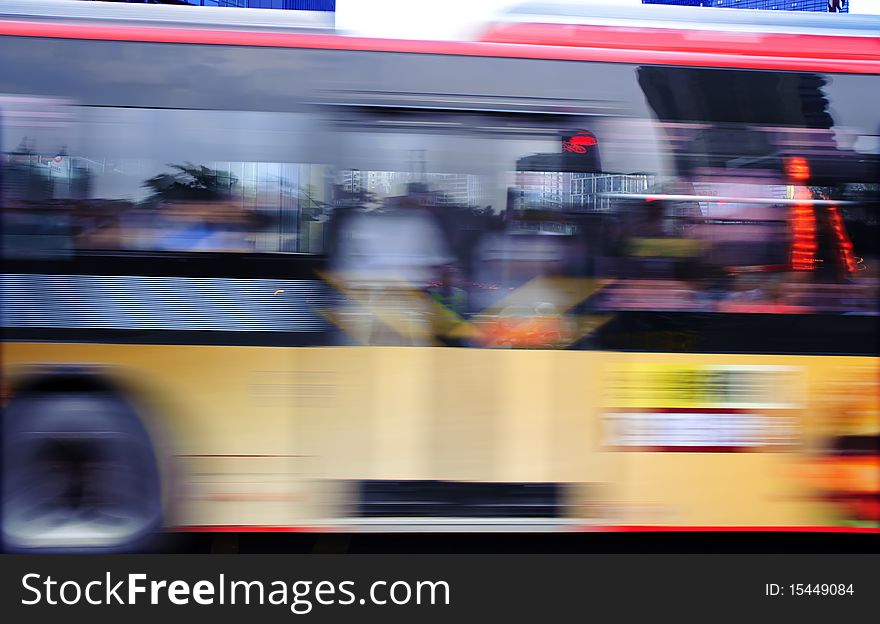 High speed and blurred bus trails on downtown road