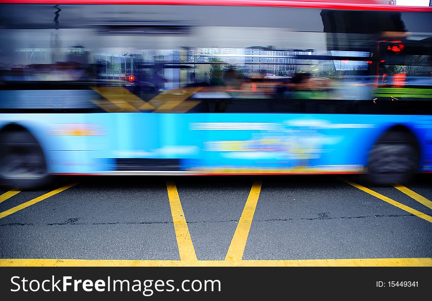 High speed and blurred bus trails on downtown road