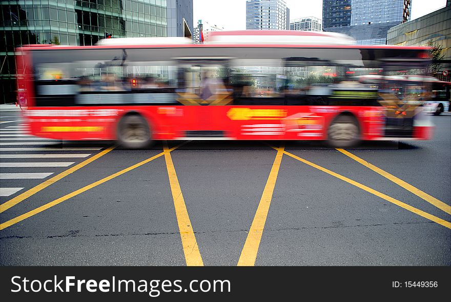 High speed and blurred bus trails on downtown road