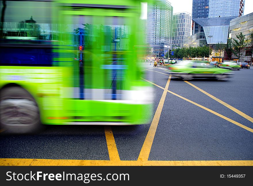 High speed and blurred bus trails on downtown road