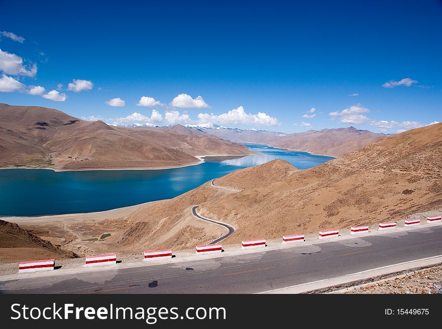 Blue lake with surrounding mountains in great tibet area. Blue lake with surrounding mountains in great tibet area