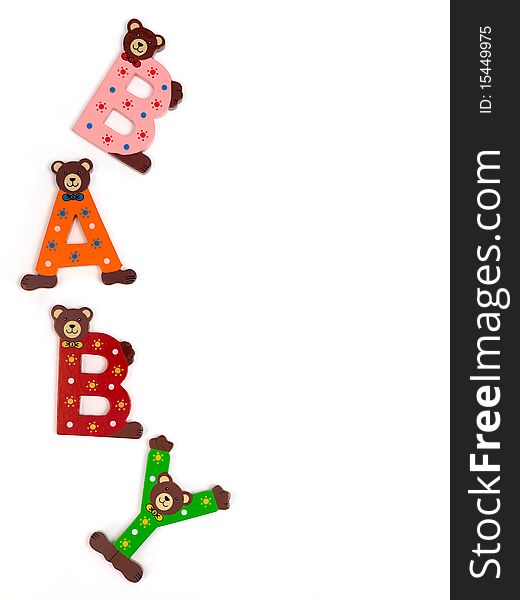 Wooden letters spelling baby isolated against a white background