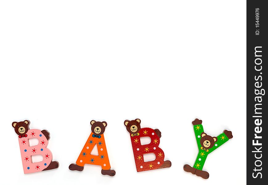 Wooden letters spelling baby isolated against a white background