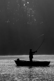 Fisherman At Dawn Royalty Free Stock Photos Fisherman At Dawn Royalty Free Stock Photos