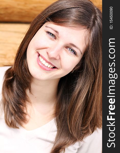 Beautiful young woman smiling. Outdoor portrait