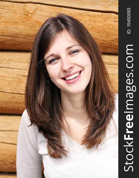 Beautiful young woman smiling. Outdoor portrait