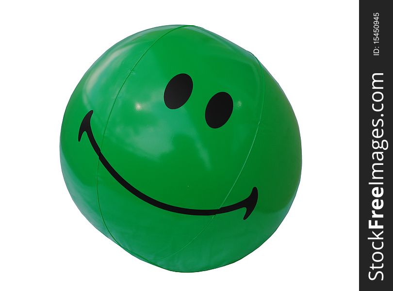 Green beach ball with a smiley face.