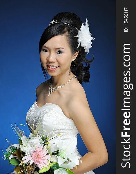 Asian woman in wedding dress