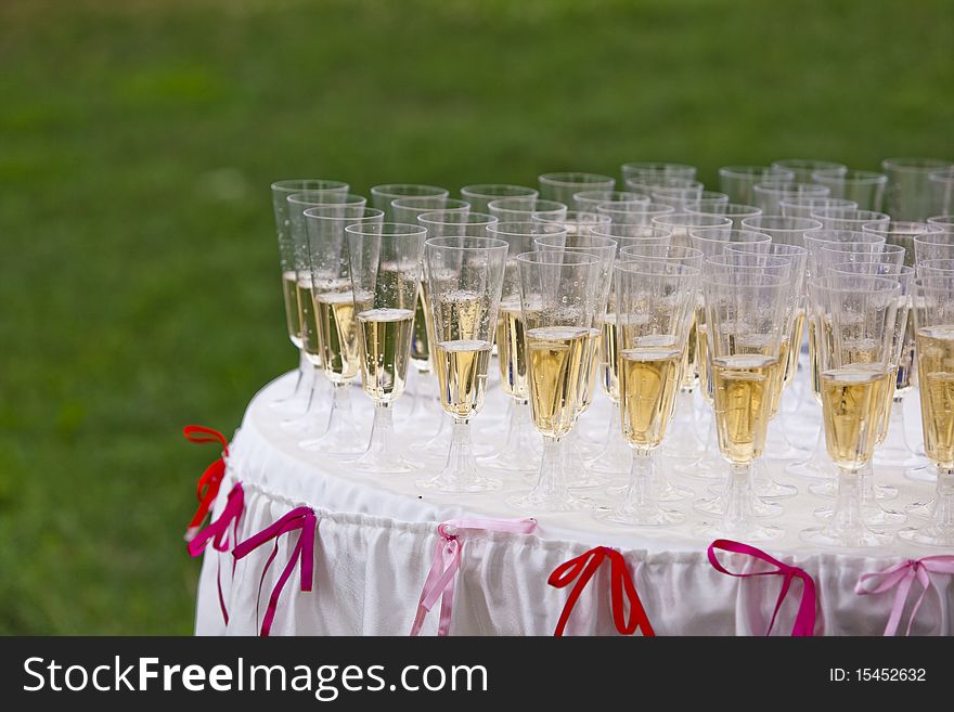 Image of glasses of champagne on the holiday table. Image of glasses of champagne on the holiday table.