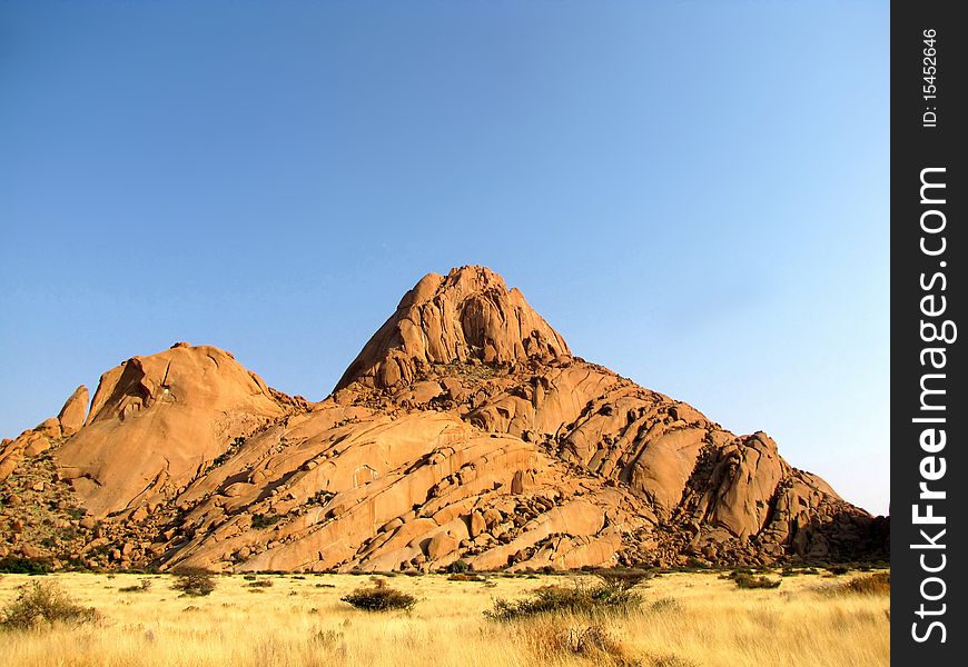 Lonely peak of Spitzkoppe mountain , Namibia