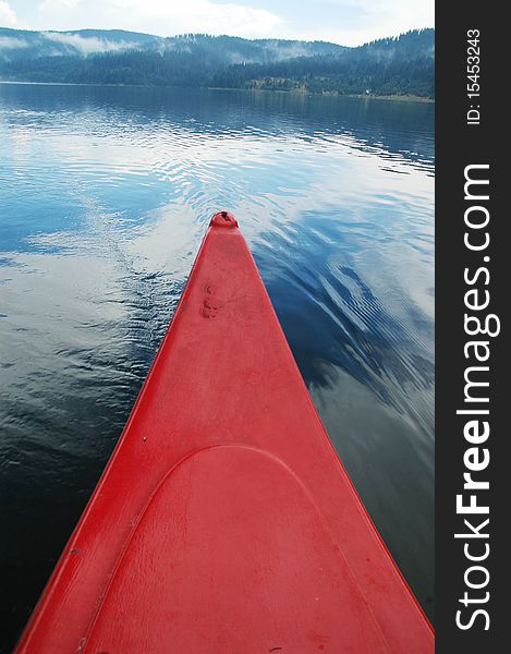 Red canoe near the lake