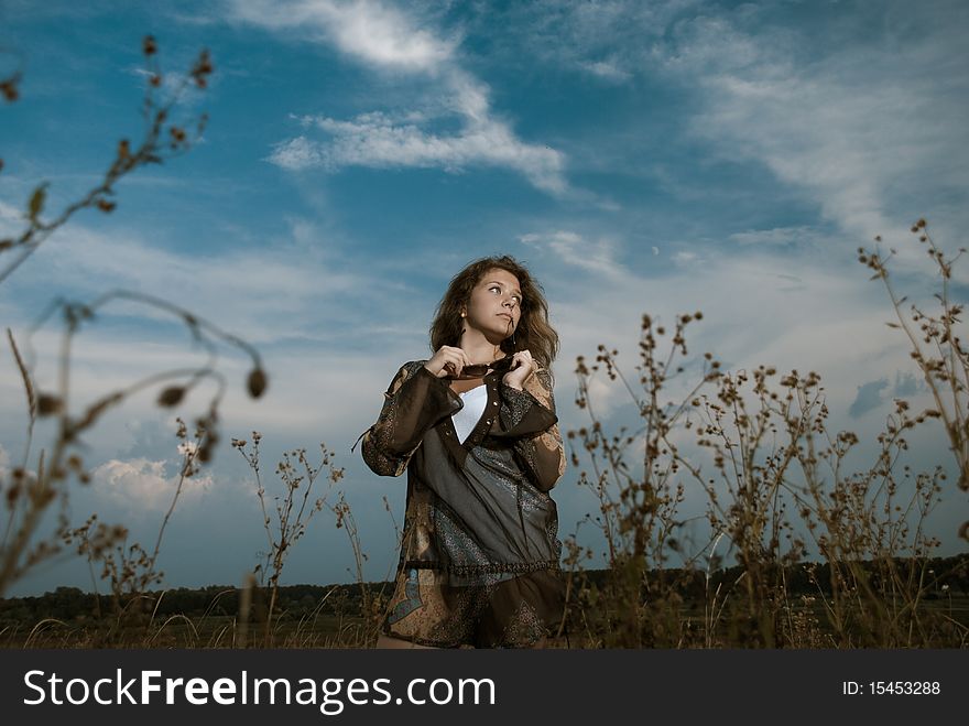 Woman At Meadow Plants