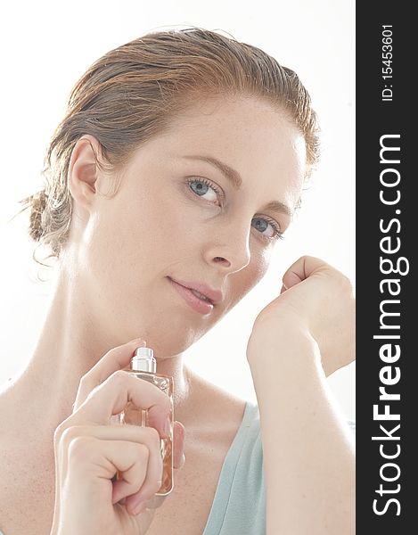 Woman Spraying Perfume