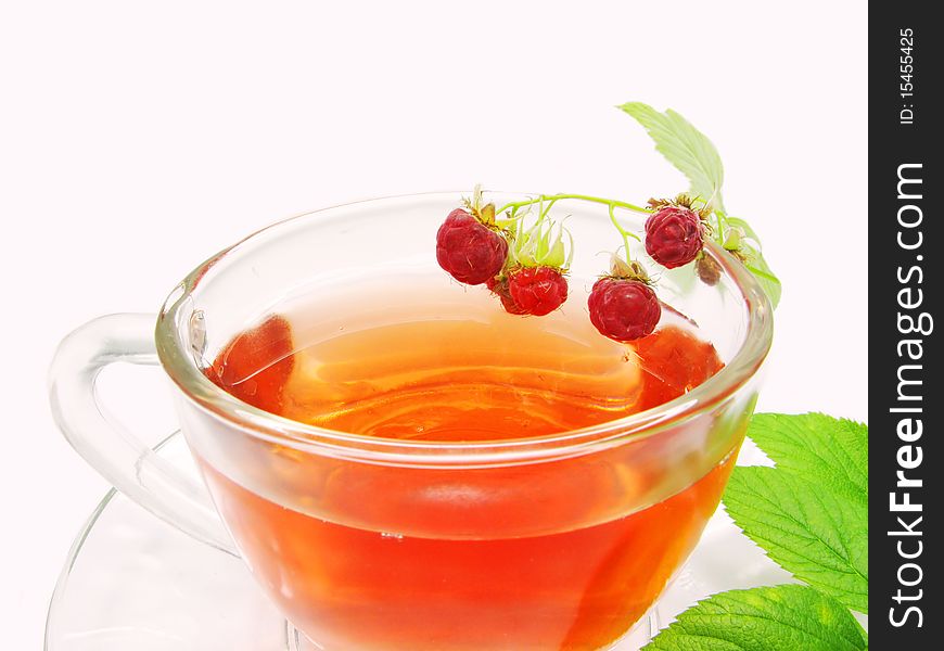 Raspberry fruit tea with berries summer drink