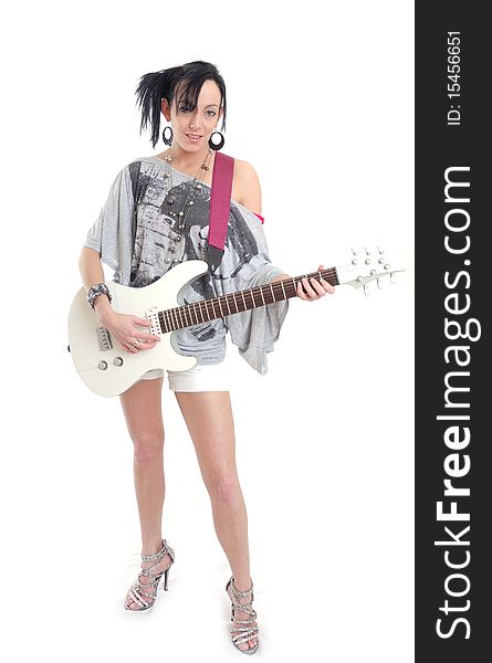 Casual sexy young woman with guitar