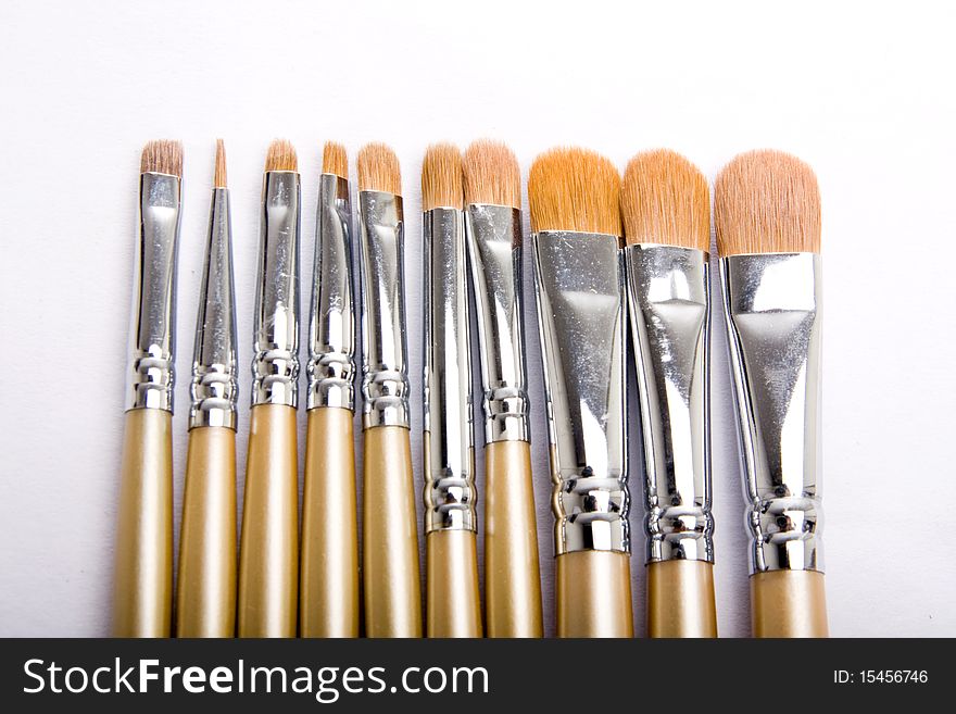 Kinds of brushes for makeup on white background